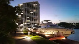 Boat rental Marina Condos Puerto Cancun yacht cruising in clear lagoon water