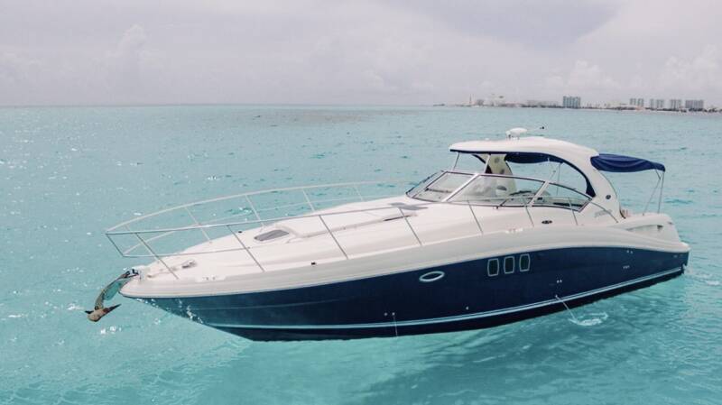 Boat rental Marina Kaybal Cancun yacht cruising through mangrove lagoon