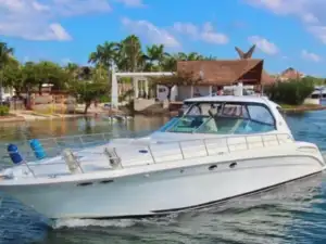 Boat rental Marina Punta Norte Cancun yacht cruising in lagoon and sea